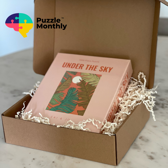 Open Puzzle Monthly box with a jigsaw puzzle inside